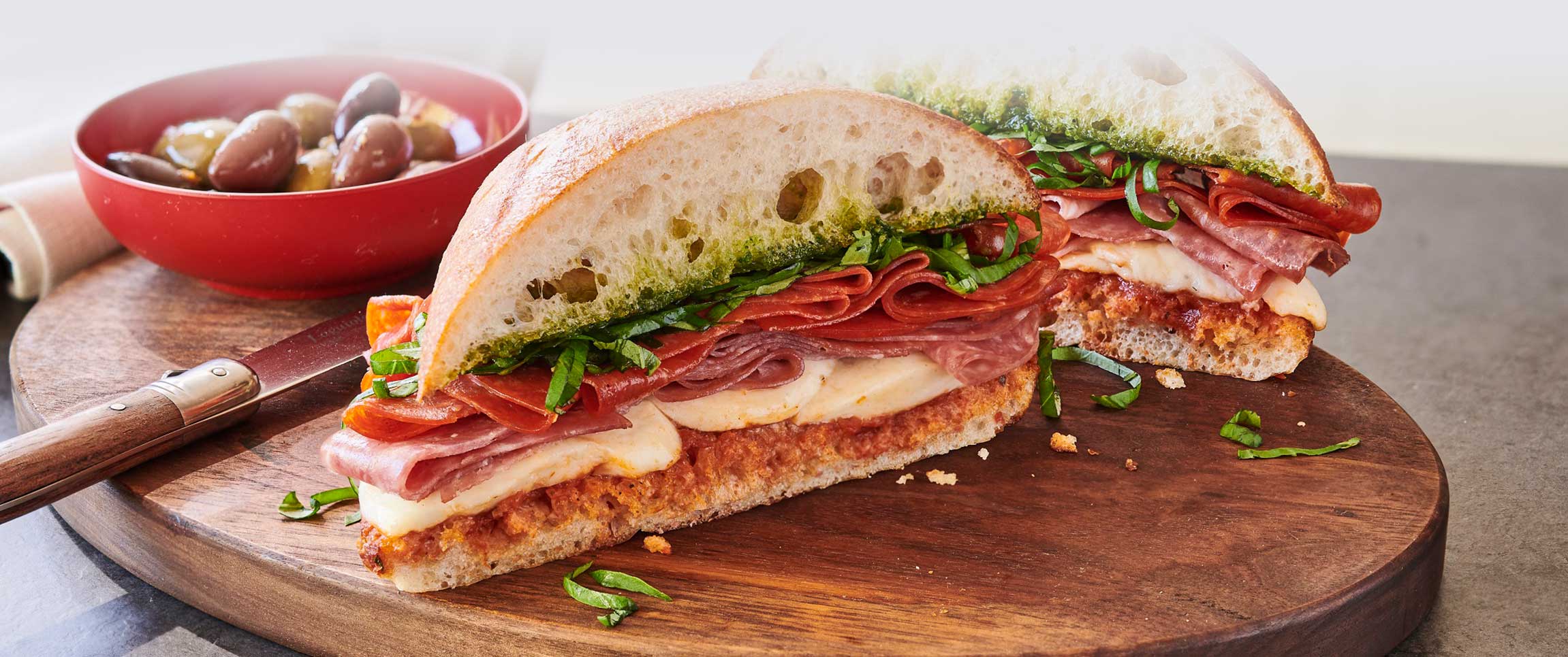 prosciutto sandwich with olive tapenade - Curedandcultivated